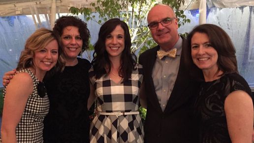 People in a group shot dressed in gingham