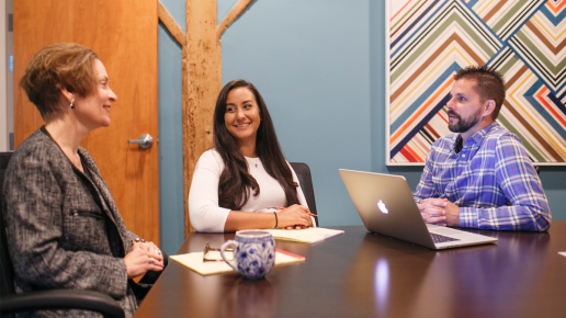 Marketers sitting at a conference table