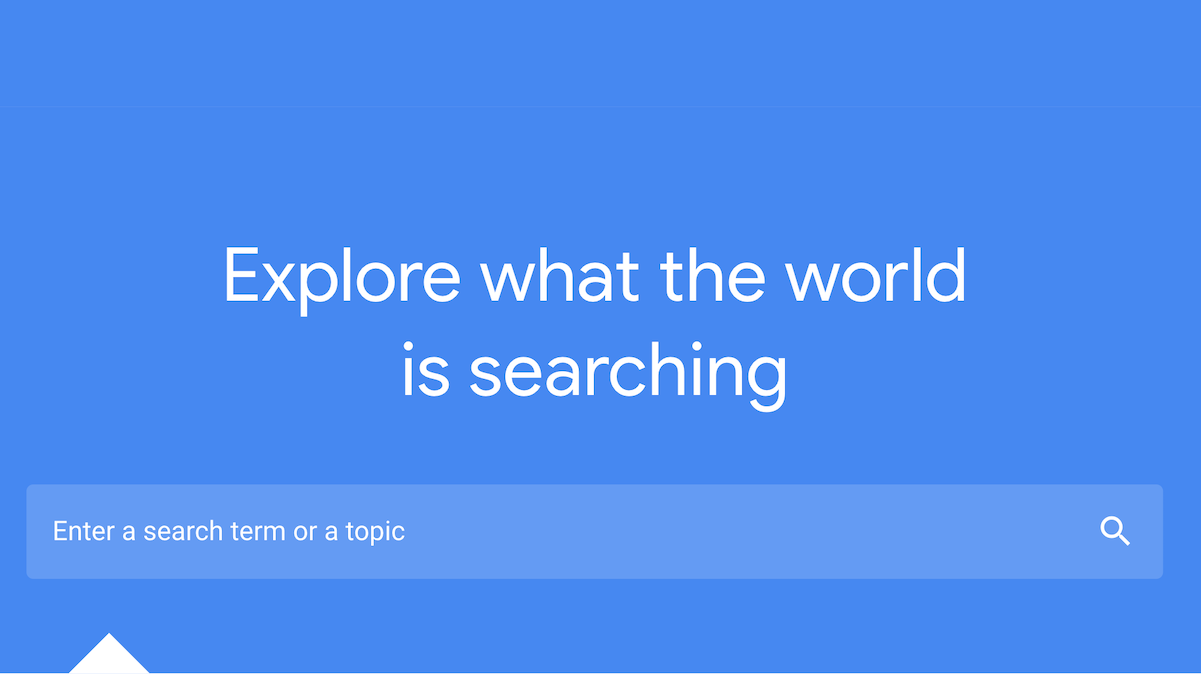 blue search box with the words "explore what the world is searching" above a search bar