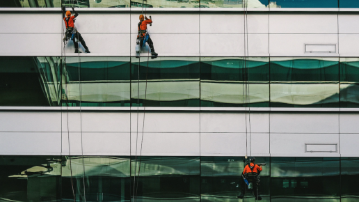 window washing crew on the side of a building